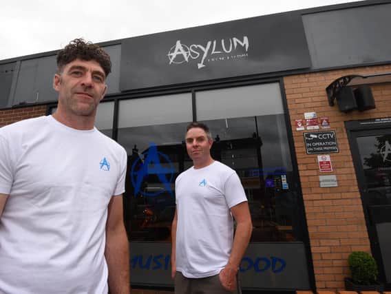 from left, Jimmy Winnard and Martin Quinlan outside Asylum, a new bar, open in Standish