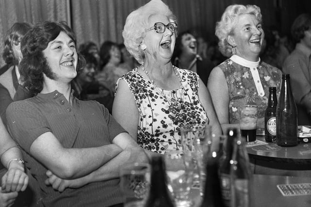 Audience reaction to comedian Bernard Manning on stage at Poolstock Cricket Club in 1973.