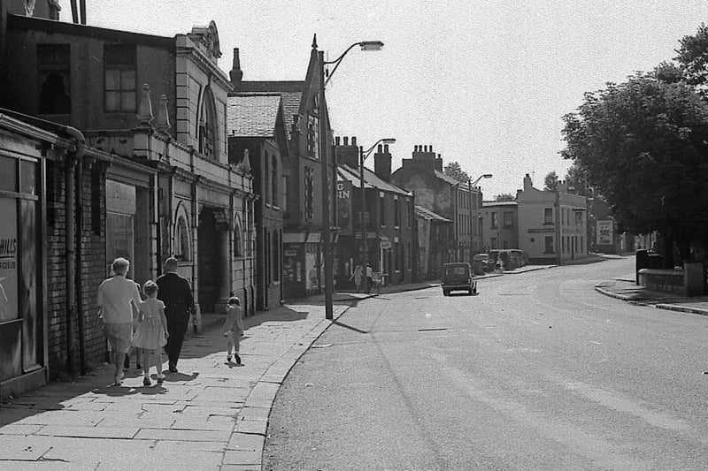 Beeston Town Street showing Beeston Picture House just in front of the family group in August 1967.
