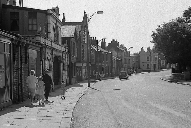 Beeston Town Street showing Beeston Picture House just in front of the family group in August 1967.