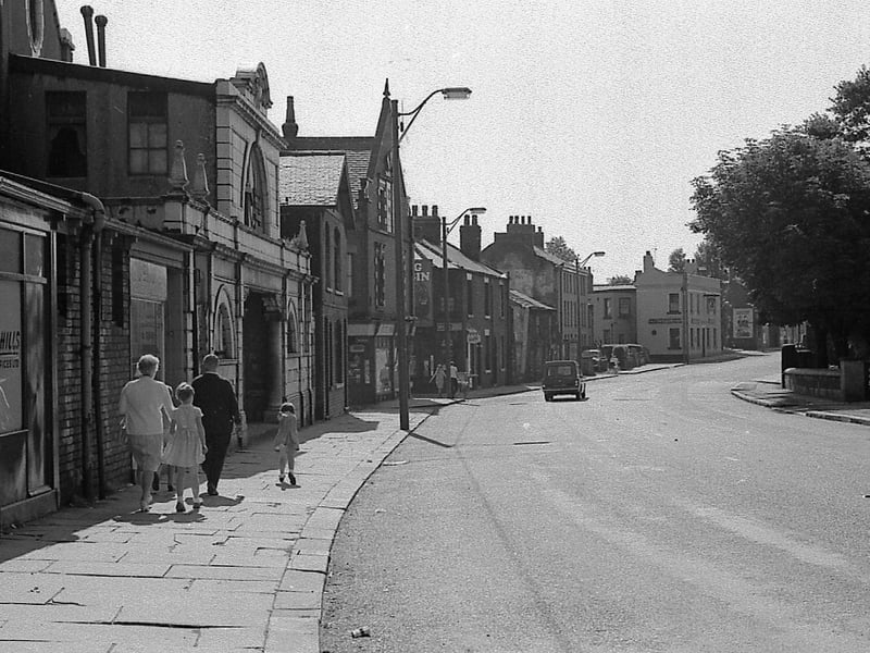 Beeston Town Street showing Beeston Picture House just in front of the family group in August 1967.
