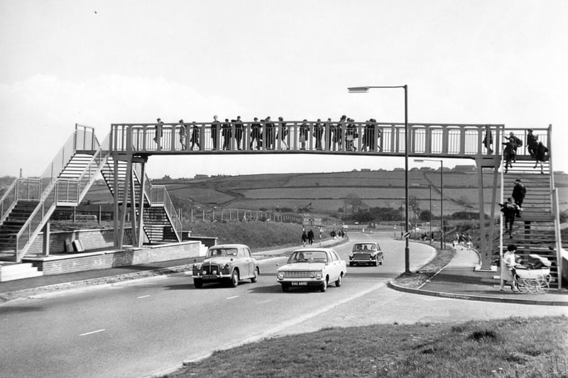 May 1967 and Priesthorpe Secondary School pupils use the new bridge which has been built for them by Pudsey Council.