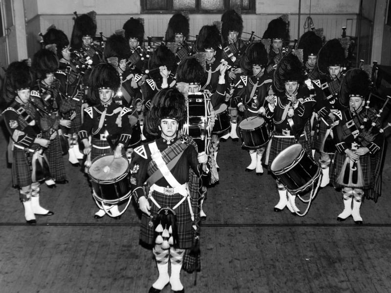 Heads turn when they march through the city - 12 pipers, seven drummers and a drum major - the City of Leeds Pipe Band