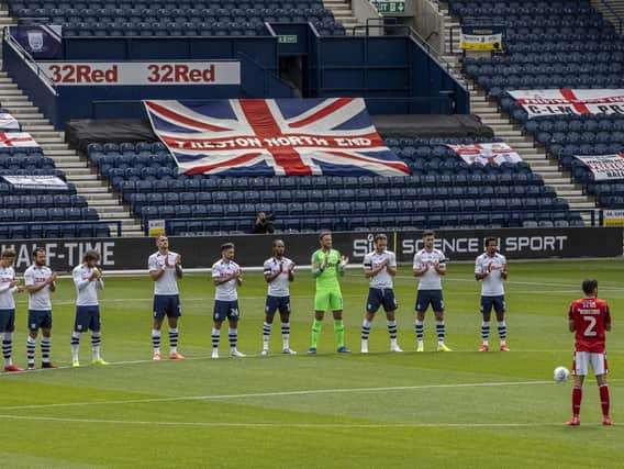 The teams hold a minute's applause in memory of Jack Charlton