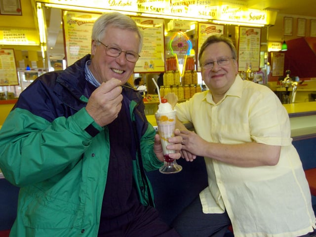 John Craven, filming for BBC's Countryfile, with Harbour Bar owner Gulian Alonzi in 2007.