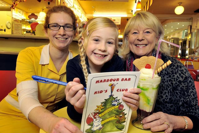 Harbour Bar Christmas club caption winner Georgina Foden, with Lola Aranyani and Theresa Alonzi, in 2014.