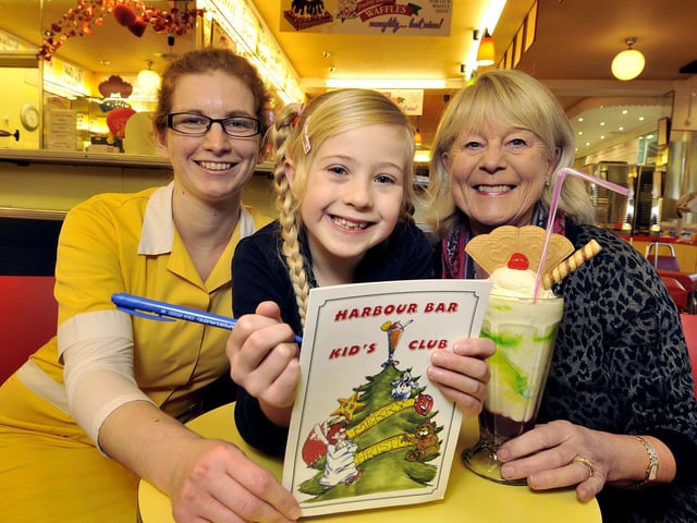 Harbour Bar Christmas club caption winner Georgina Foden, with Lola Aranyani and Theresa Alonzi, in 2014.