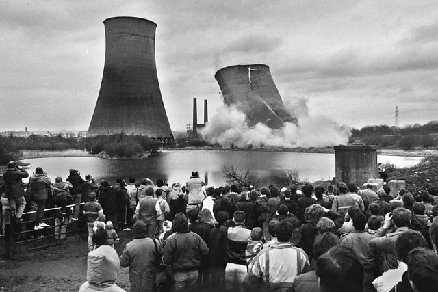 A large crowd gathers at a safe distance as the first of the Westwood Power Station cooling towers is blown up at 10.15am on Sunday 15th of January 1989.