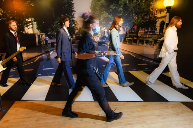 Staff at Madame Tussauds Blackpool have created a new one way system throughout the attraction - the famous Beatles Abbey Road LP cover, featuring George, Paul, Ringo and John walking over a zebra crossing.