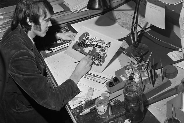 An artist designing an advertisement for the Post and Chronicle newspaper at Brock Mill in Leyland Mill Lane in 1971.