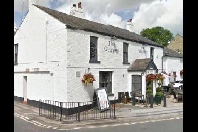 The Grapes is adelightful 19th century country pub in the picturesque Lancashire village of Wrea Green, overlooking the village green and duck pond.
