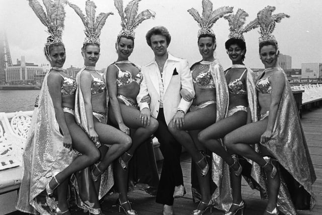 Impressionist Bobby Davro with the Marina Zelos dancers on Central Pier , Blackpool, May 1983