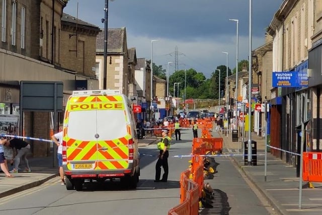 Commercial Street in Brighouse was sealed off by police