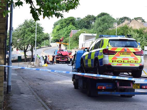 The red car, which was involved in the incident, was removed around 11am today