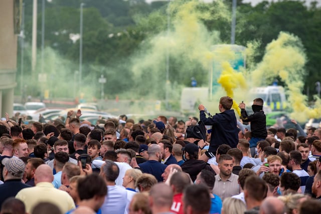 It was a sea of blue and yellow as fans set off flares outside the ground