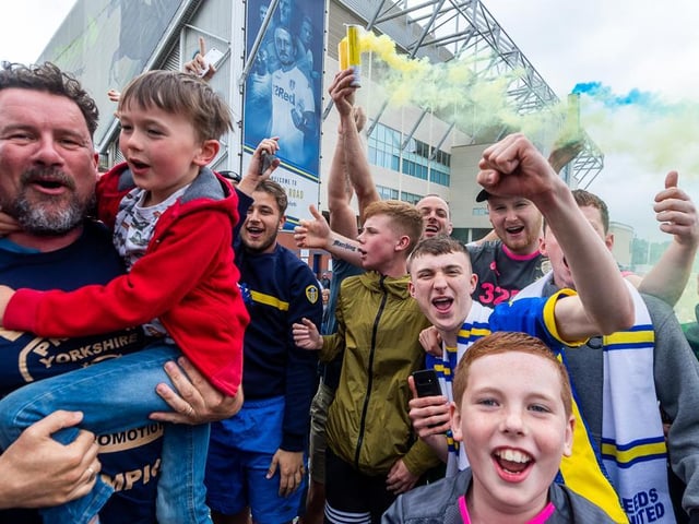 Fans young and old enjoy the atmosphere at Elland Road as the club were crowned champions.