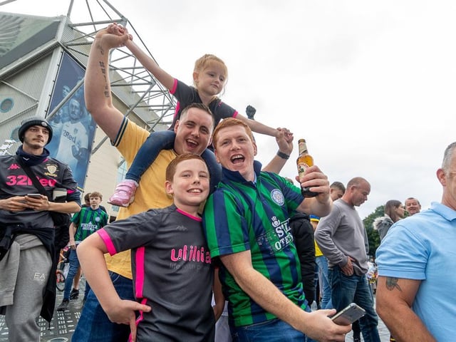 Fans young and old celebrating.