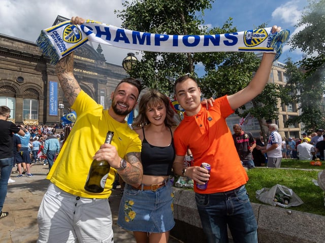 Leeds United fans celebrate at Millennium Square.