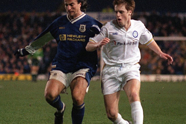 Alan Maybury holds off David Ginola as the Whites edged out Spurs thanks to a goal from Harry Kewell.