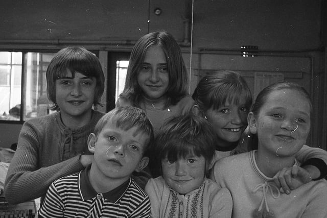 The Fox children and their friends the Parkinson twins were faced with a six-foot problem when collecting for their charity jumble sale at Longridge. How to get a wardrobe to the Fox home in Severn Street? Uncle Joe to the rescue! The kind-hearted children, who organised the jumble sale to raise money for disabled children, are pictured above, from left to right: Susan Parkinson, Edward Fox, Judith Parkinson, Helen Fox, Elizabeth Fox and Kathleen Fox