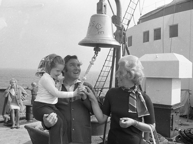 To mum and dad it's the return of a holiday treat they knew in their youth. To the crowds of happy, excited youngsters it's all a brand new adventure. And to thousands of people in Lancashire it's the sailing event of the decade - the return of the Isle of Man Steam Packet Company's sailings from Fleetwood to Douglas. Pictured above: Three-year-old Debbie Dugdale does her own thing with the Mona's Isle bell, watched by parents Frank and Marleine, from Blackpool