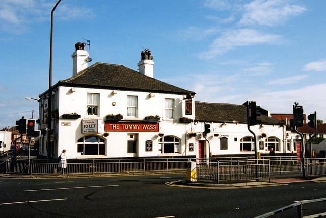 The white-rendered Tommy Wass Public House at number 450 Dewsbury Road standing at the junction with Old Lane and the Ring Road at Beeston Park. This photo was taken in 2005.