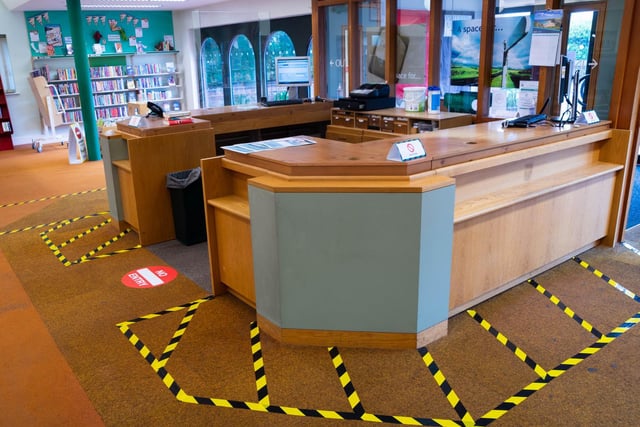 Markings have been put around the front desk to keep staff and visitors at a safe distance from each other.