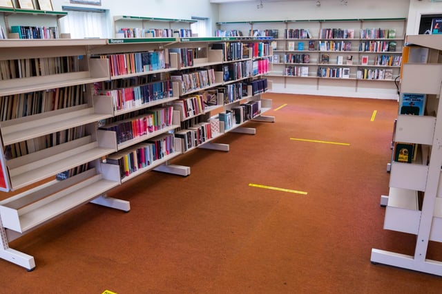 Some shelving has been removed and markers laid on the floor to make more space, so visitors can safely browse during their allocated 30 minutes without worrying about accidentally bumping into someone else.
