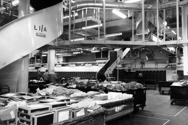 Packets awaiting sorting in the distribution area at Royal Mail House in February 1976.