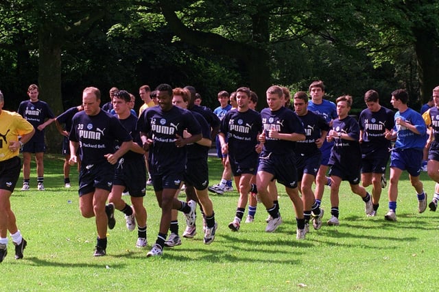 Eddie Gray leads off a group of Leeds United players as they start pre-season ahead of the 1997-98 campaign.