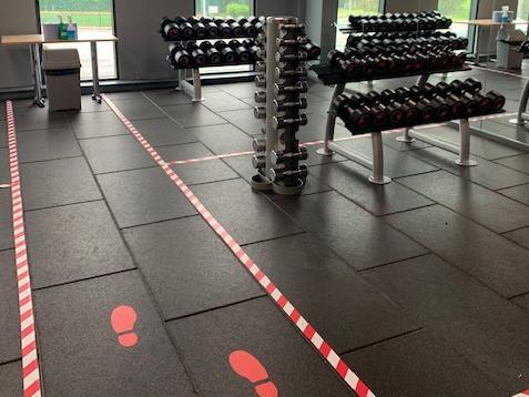 In the weights section of the studio, markers have been put onto the floor to guide members around, and to ensure social distancing rules are met.