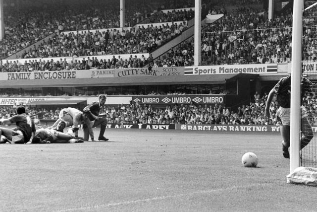 Gary Speed's shot trickles into the corner of the net despite the best efforts of Everton defender Dave Watson.