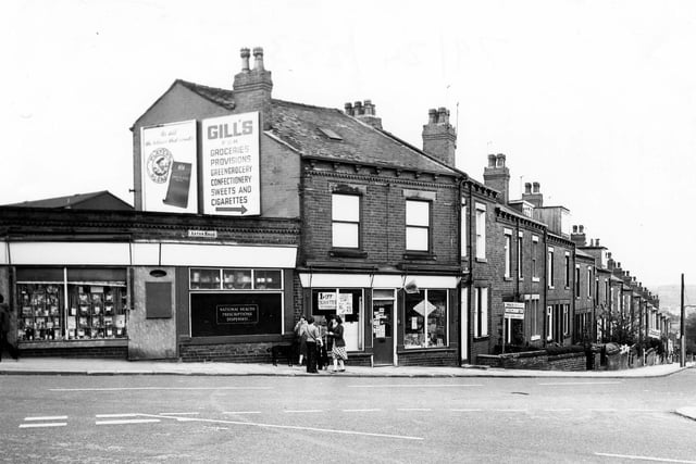 Aston Road seen from the junction with Highfield Road in May 1979. On the left is Aston Pharmacy then a newsagents/tobacconists.