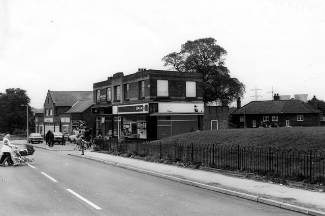Parade of shops on Raynville Road in April 1979 that include a Co-op, a hair stylist and a Spar on the far right.