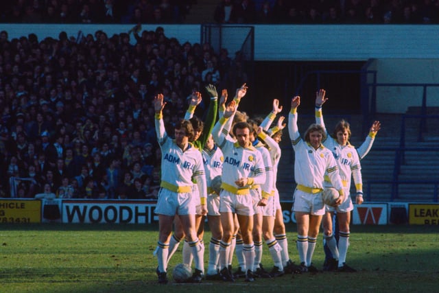 The players wave ahead of kick off during the 1976/77 campaign.