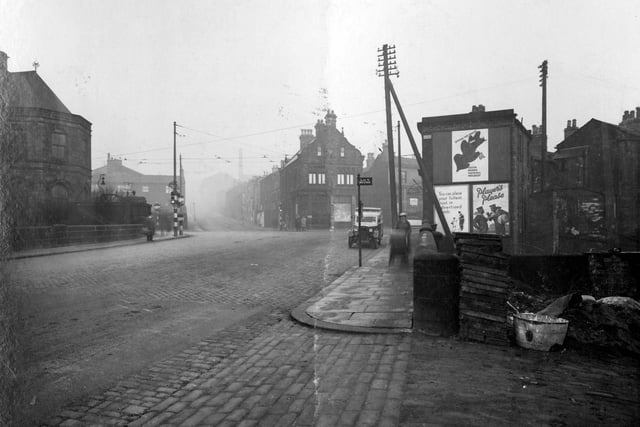 View from Bridge Road in January 1937 toward junction with Abbey Road and Commercial Road to the right. The Police station is on the left in centre of photograph.