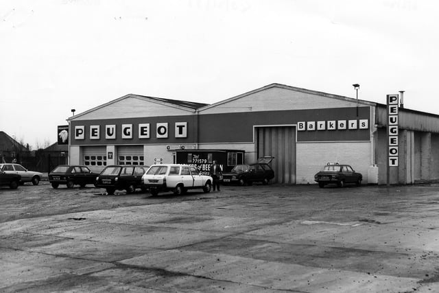 Barker's garage and car showroom, a Peugeot dealer, on Old Lane in February 1980.