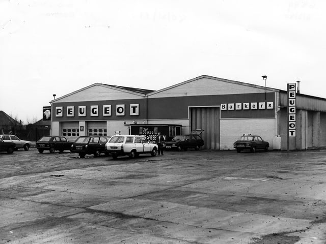 Barker's garage and car showroom, a Peugeot dealer, on Old Lane in February 1980.