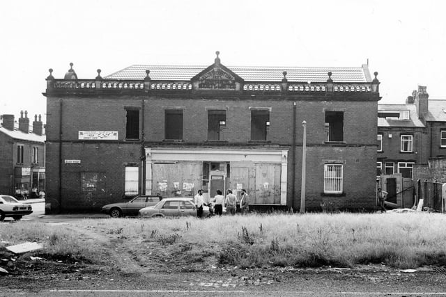 Front view of the former Leeds Industrial Co-operative Society Building in July 1984. The view looks across to Hardy Street over waste land where Ellis Place once stood.