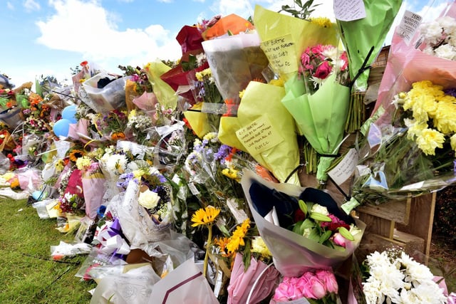 Floral tributes at the scene of the accident