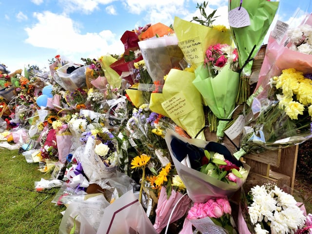 Floral tributes at the scene of the accident