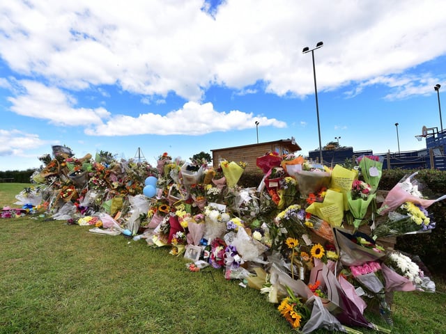 Floral tributes at the scene of the accident
