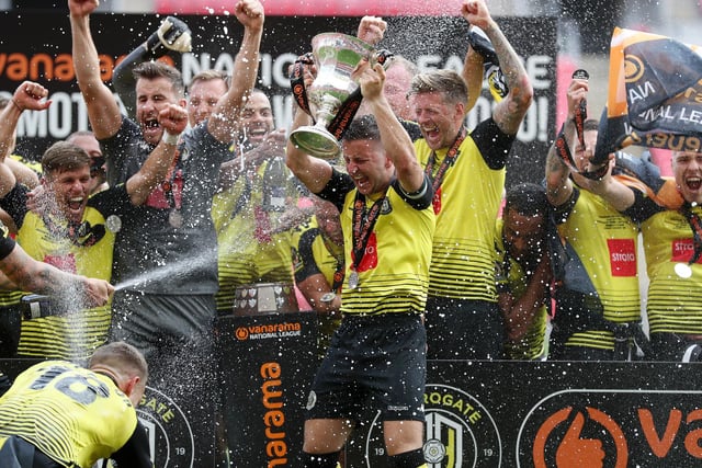 Champagne Supernovas!!!! Harrogate Town players celebrate reaching the Football League for the first time in their history.