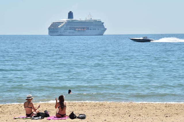 Bournemouth Beach has been making the news for all the wrong reasons recently but temperatures in Halifax are set to match those on the south coast(Photo by GLYN KIRK/AFP via Getty Images).