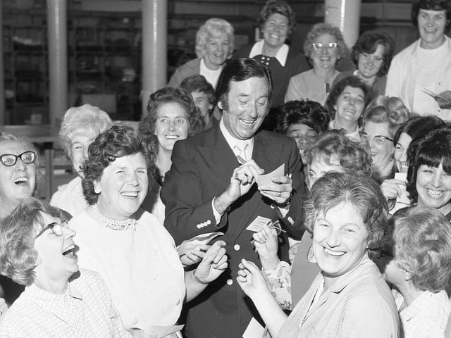 The thousand women who work at a Preston mail order firm had one complaint. There weren't enough males to order! After they had tackled operations manager, Mr John Gunning, about it, he thought he had better do something. So he invited comedian Jack Douglas to tour the firm's Tulketh Mill to cheer them up a bit