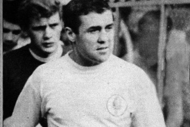 Leeds United are led out by captain Bobby Collins ahead of kick-off. (Varley Picture Agency)