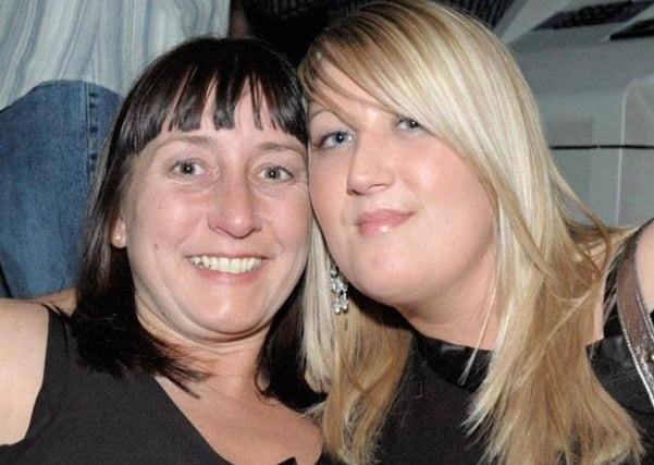 Alison and Lorraine pose for a picture in February 2006.