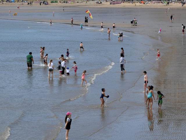 Many cooled down by taking a dip in the sea.