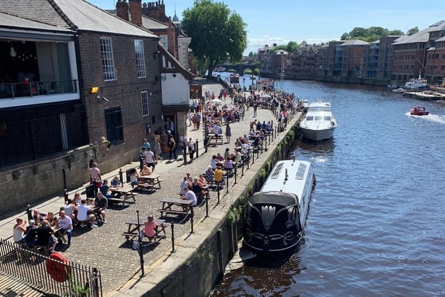 Making the most of the summer, people headed down to have a drink in the beer gardens by the River Ouse.