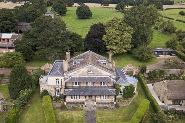 On the market for £1,000,000, this eight bedroom home boasts multiple reception rooms, vaulted cellars with wine storage and multiple reception rooms/